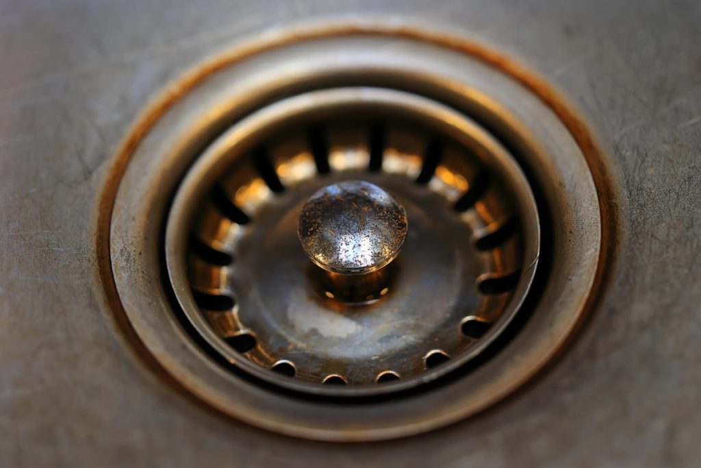 Close-up of a sink drain strainer