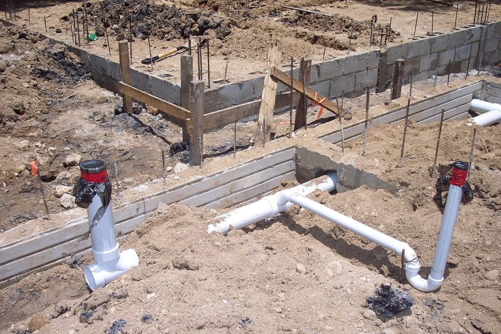 New PVC sewer lines laid in an excavation