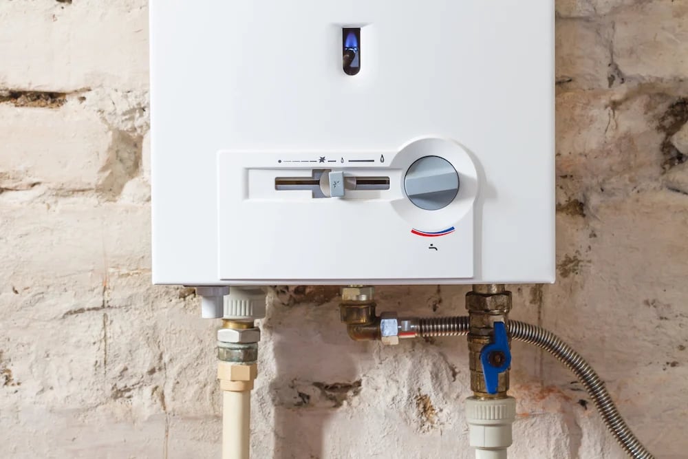 Tankless water heater unit and its pipe connections